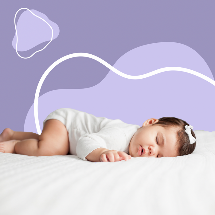 A baby wide awake in the middle of the night during a split night pattern